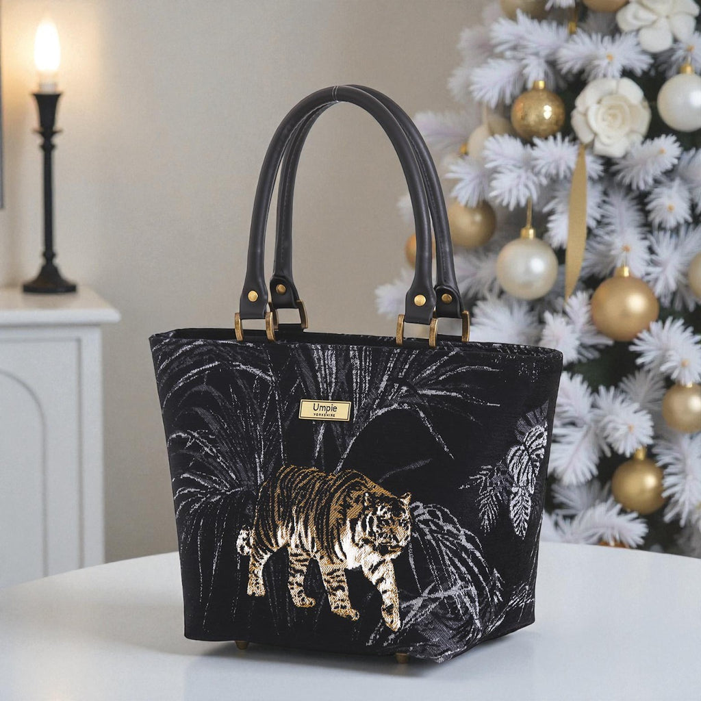 Tiger handbag in vibrant gold and black tapestry fabric with premium black leather handles, structured silhouette and artisan British craftsmanship by Umpie Handbags
