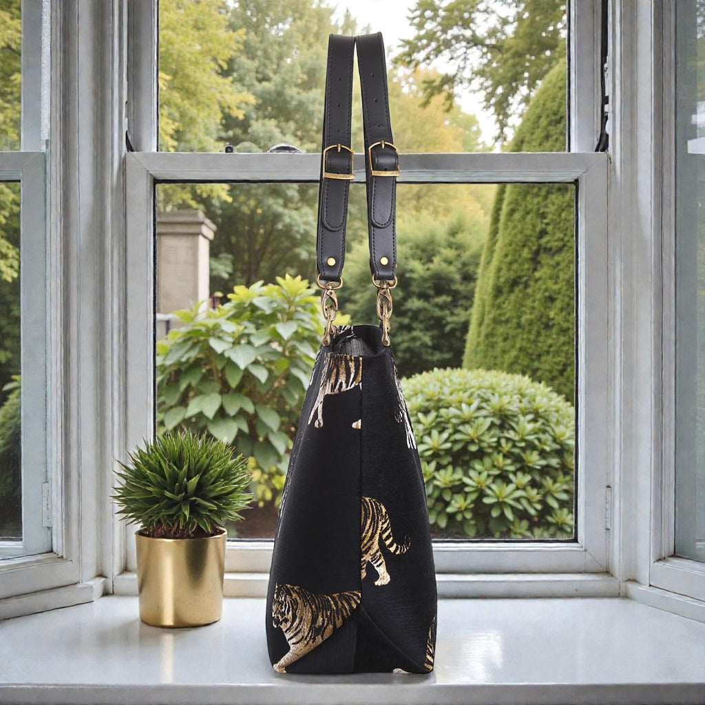 Side profile of Tiger Tote Bag displaying structured silhouette and premium leather straps by Umpie Handbags

