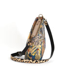 Toucan Tapestry Crossbody Bag top view showing zip-top closure, structured construction , leopard print leather strap with antique gold fittings, by Umpie Handbags