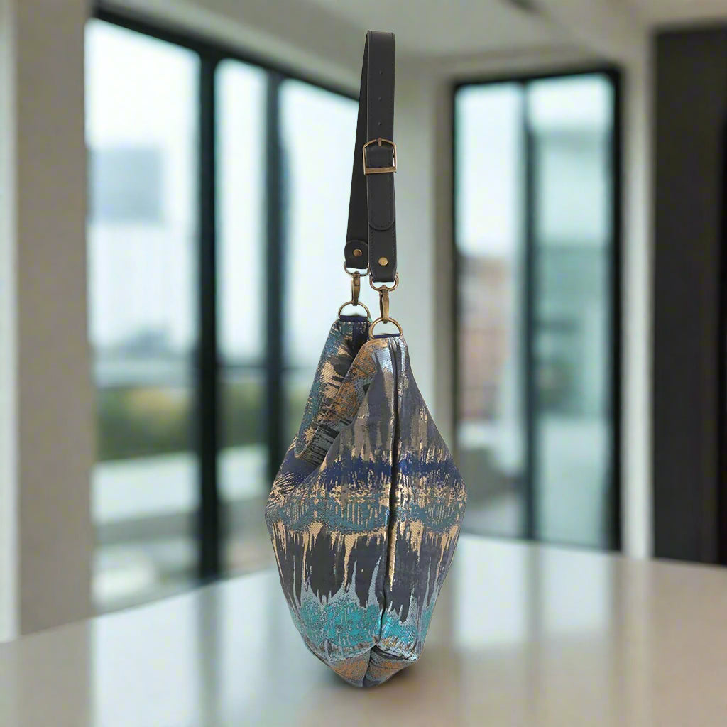 The Turquoise Metallic Hobo Bag - side view