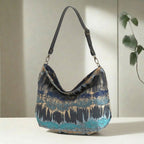 Teal Metallic Hobo Bag displaying relaxed hobo silhouette and adjustable black leather strap by Umpie Handbags