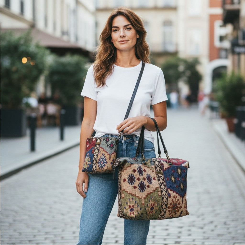 Two piece Weekend Travel Set, crossbody bag and holdall in kilim style canvas with black leather straps, by Umpie Handbags