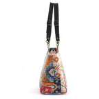 Kilim Velvet Shoulder Bag showcasing rich texture and traditional geometric design with black leather straps by Umpie Handbags - side view