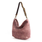 Luxurious Pink velvet hobo bag with bold leopard print leather strap, front view showing rich texture and slouchy silhouette by Umpie Handbags