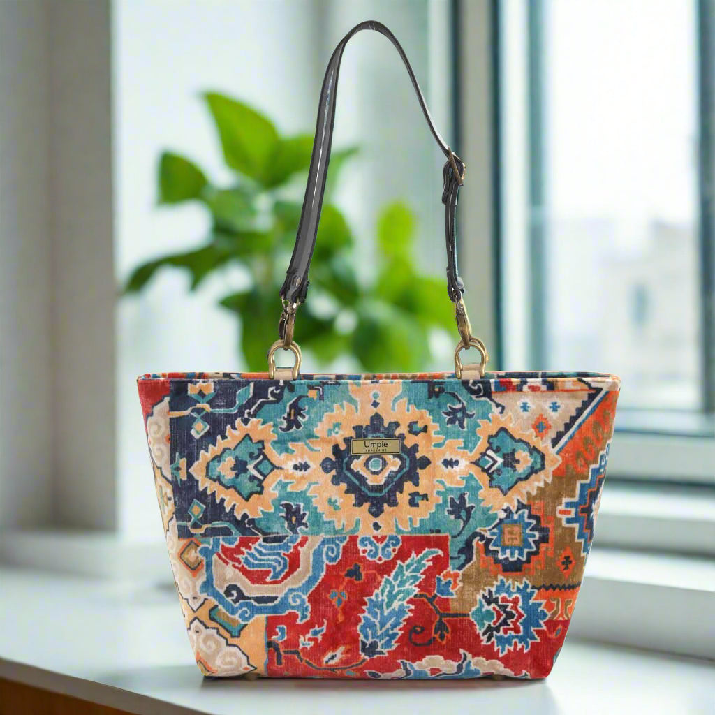 Velvet Kilim Shoulder Bag showcasing rich texture and traditional geometric design with leather strap by Umpie Handbags