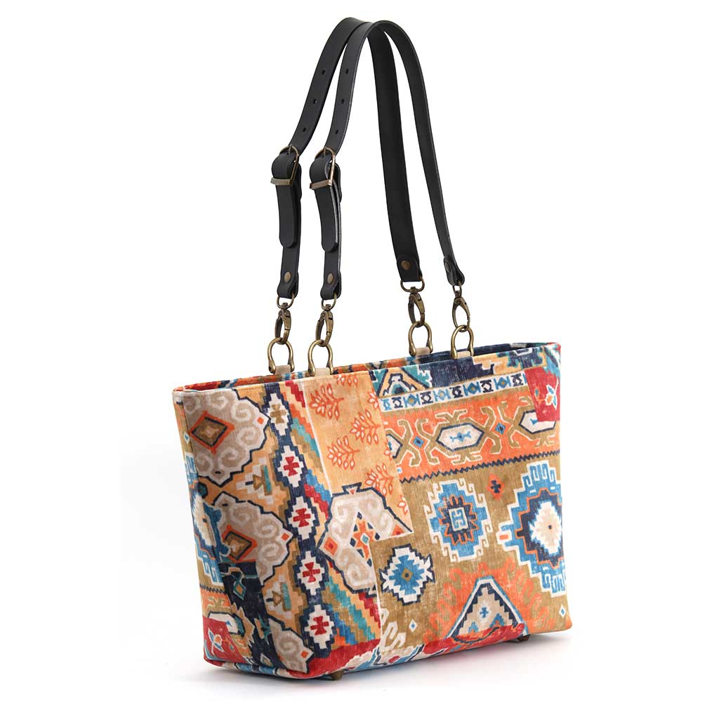 Kilim Velvet Shoulder Bag showcasing rich texture and traditional geometric design with black leather straps by Umpie Handbags - back view