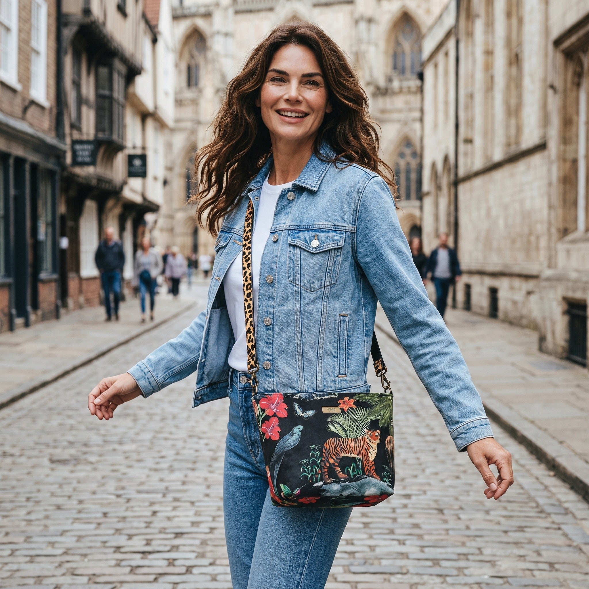Luxurious printed velvet tiger crossbody bag with leopard print leather strap showing rich texture and exotic pattern by Umpie Handbags