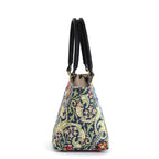 Side view of William Morris Handbag showing exquisite Golden Lily tapestry design by Umpie Handbags