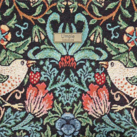 Luxurious hobo bag featuring William Morris's iconic Strawberry Thief pattern in rich indigo blue with delicate birds and strawberry motifs, crafted with premium fabric and leather trim, fabric close-up view showcasing the Strawberry Thief fabric by Umpie Handbags