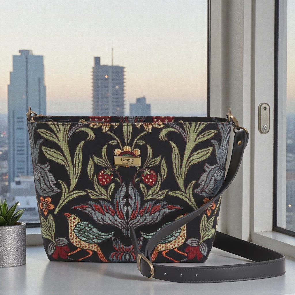 William Morris crossbody bag front view showcasing intricate Victorian botanical tapestry fabric with premium black leather strap by Umpie Handbags