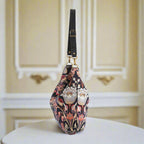 William Morris Hobo Bag - elegant side profile displaying curved silhouette and premium black leather handle by Umpie Handbags
