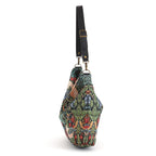 Side profile of William Morris Hobo Bag displaying relaxed hobo silhouette and adjustable leather strap by Umpie Handbags
