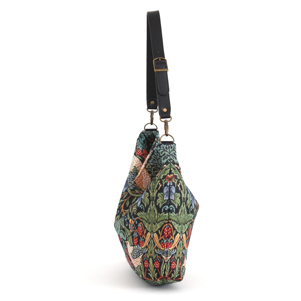 Side profile of William Morris Hobo Bag displaying relaxed hobo silhouette and adjustable leather strap by Umpie Handbags