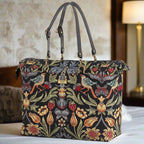 William Morris weekender bag showcasing spacious design with iconic Arts and Crafts movement pattern, premium tapestry construction, and luxurious black leather accents by Umpie Handbags