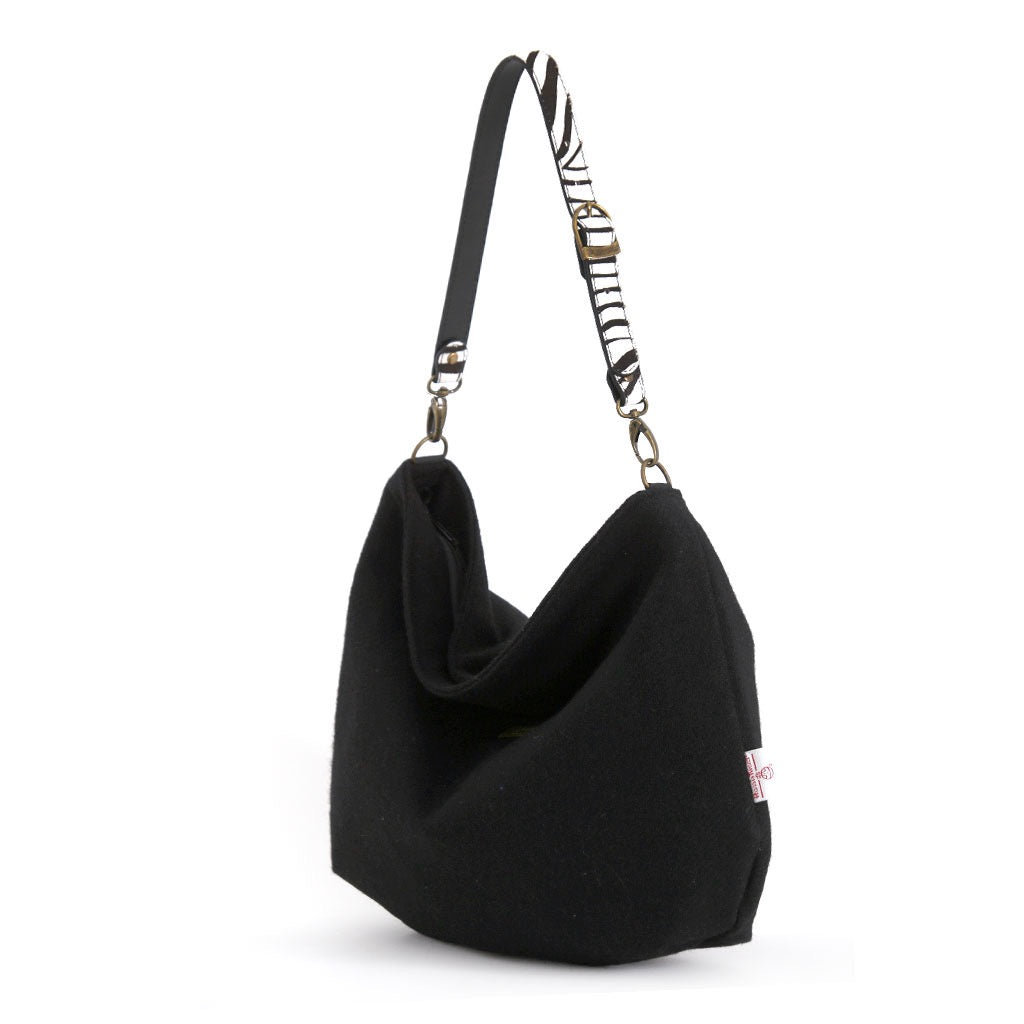 Black Harris Tweed Hobo Bag with zebra print leather strap, by Umpie Handbags