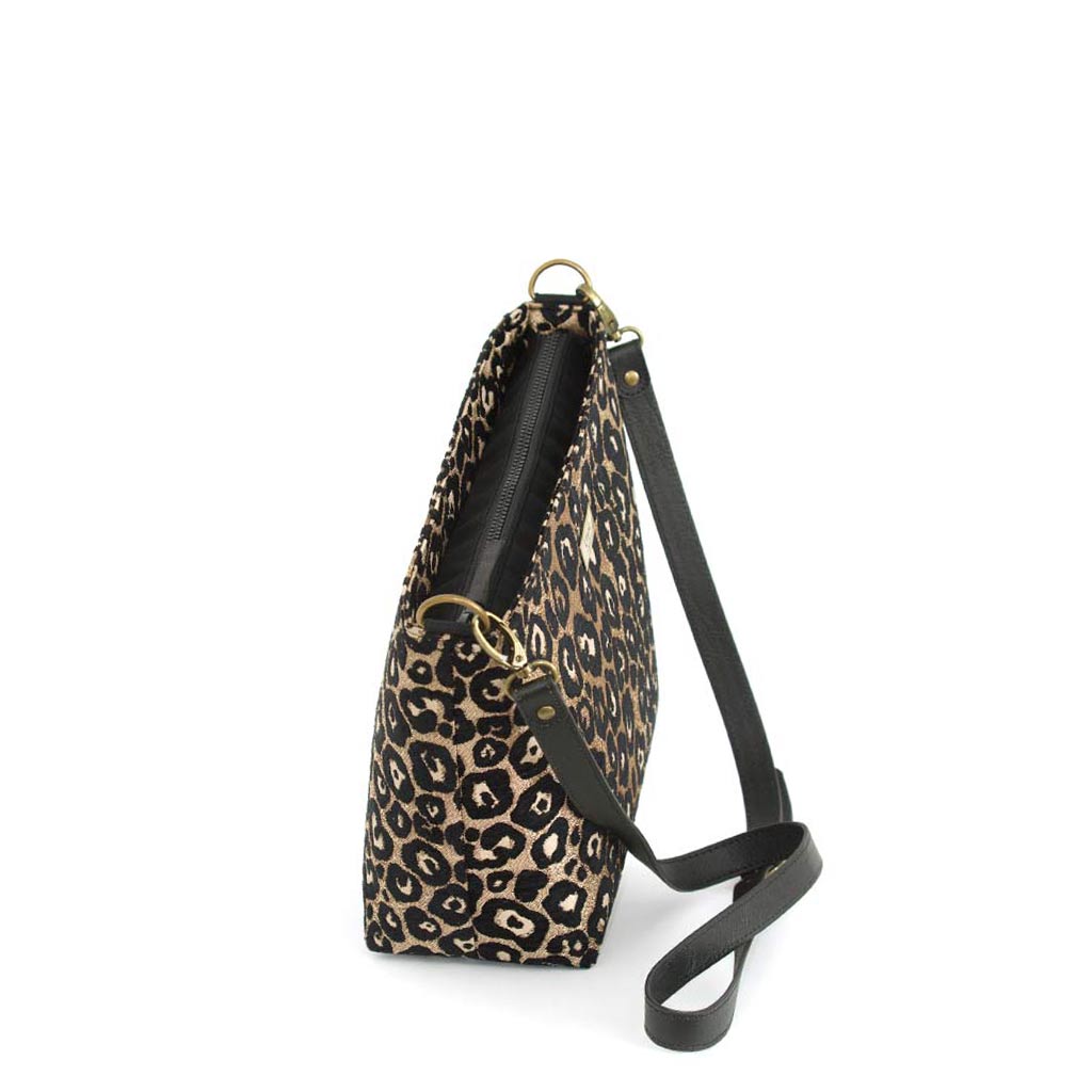 Leopard print crossbody bag with black leather strap by Umpie Handbags, zip-top view