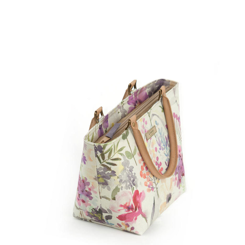 Zip-top view of Lilac Floral Handbag with tan leather handles by Umpie Bags