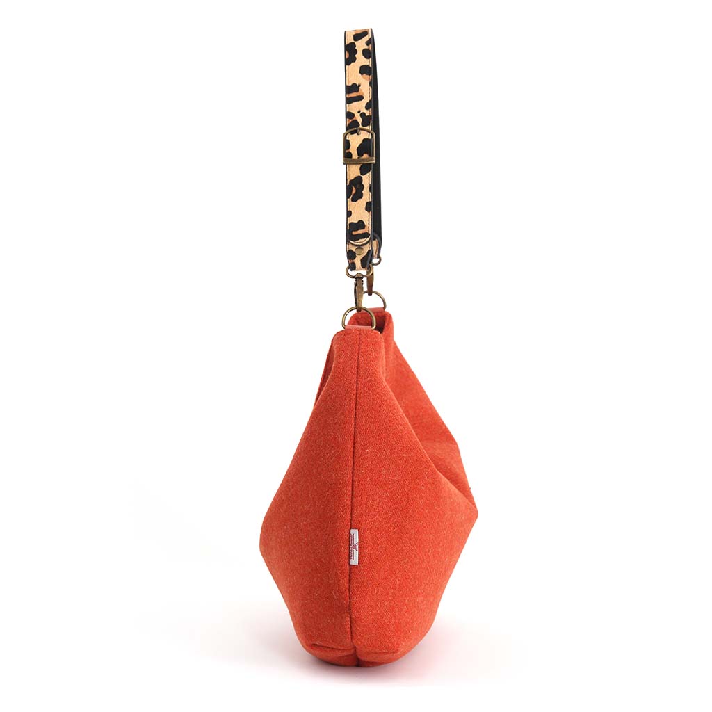 Orange Harris Tweed Hobo Bag with a leopard print leather strap by Umpie Handbags - side view