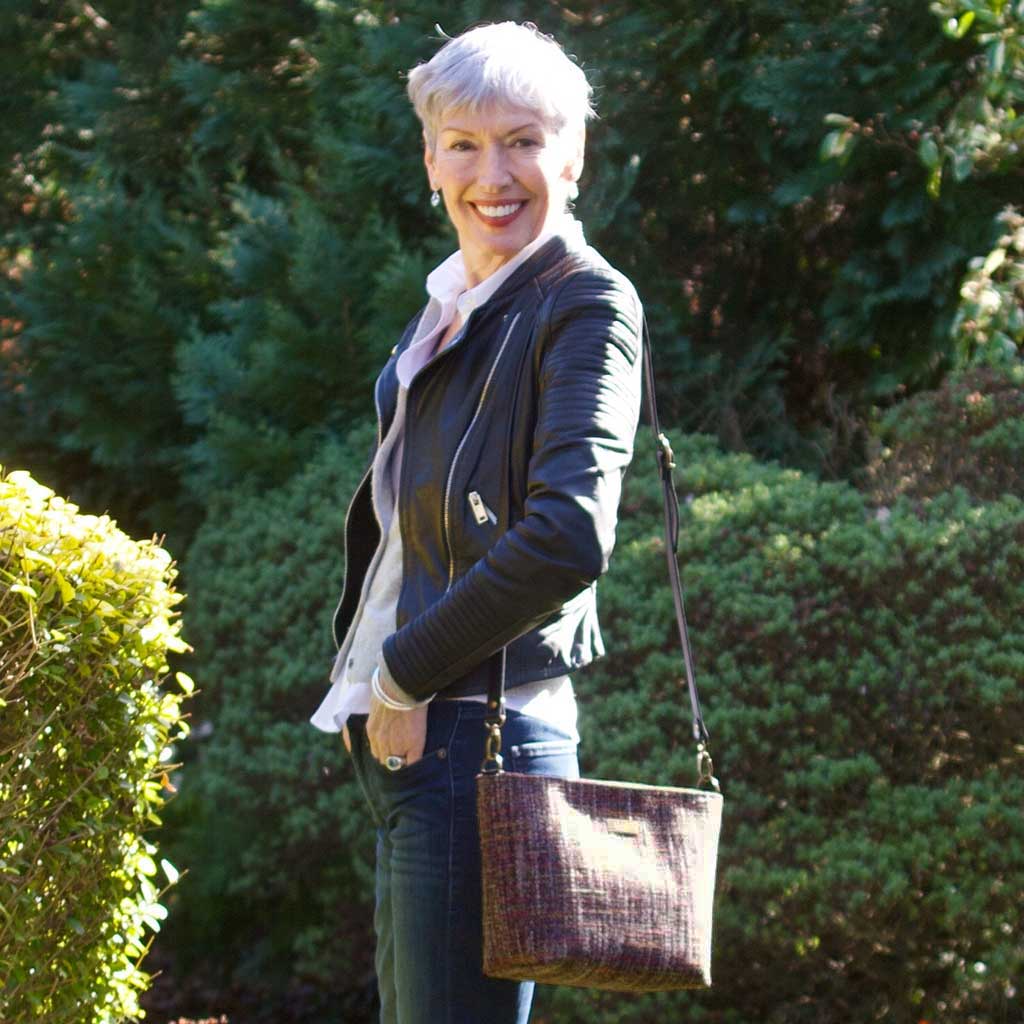 Women wearing the Pink Tweed Crossbody Bag with black leather strap, by Umpie Bags